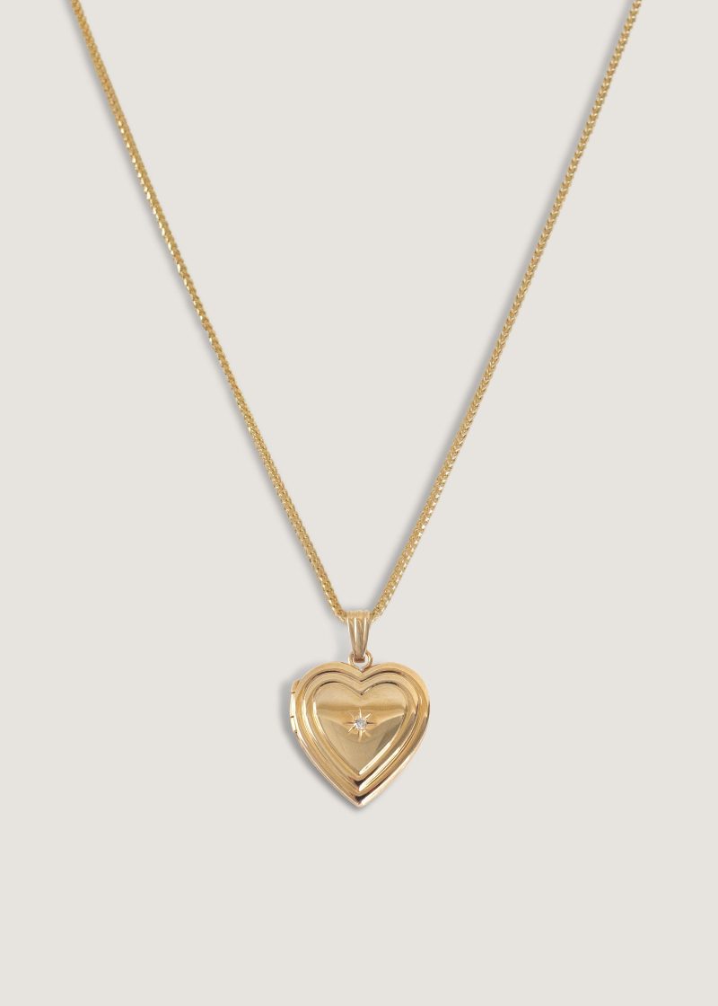 alt="Maison Ribbed Heart Locket Necklace II"