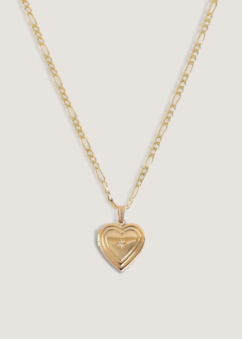 alt="Maison Ribbed Heart Locket Necklace II"