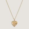 alt="Maison Ribbed Heart Locket Necklace II"